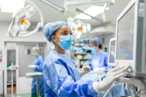 Operating room nurses, doctors, and crew getting ready for operation.